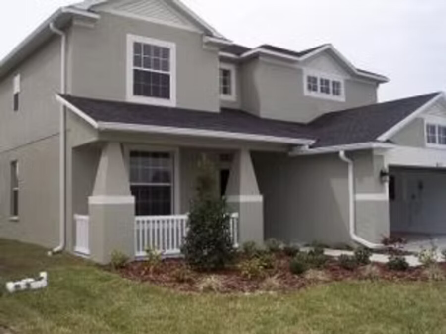 Darker gutter run across a two-story elevation