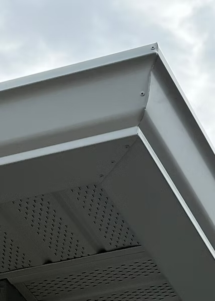 Hand-cut miter and vented soffit, viewed from below